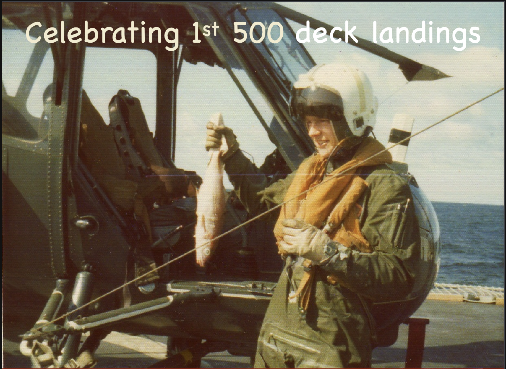 Lorimer celebrating his first 500 helicopter deck landings